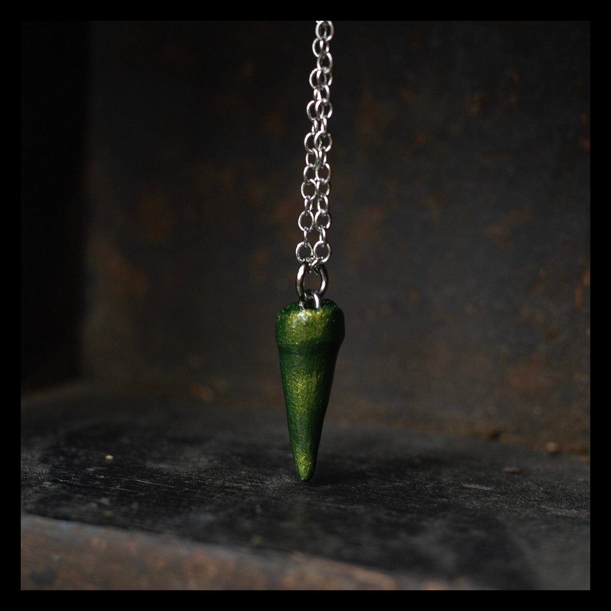 Premolar tooth necklace in "Moss" on silver chain