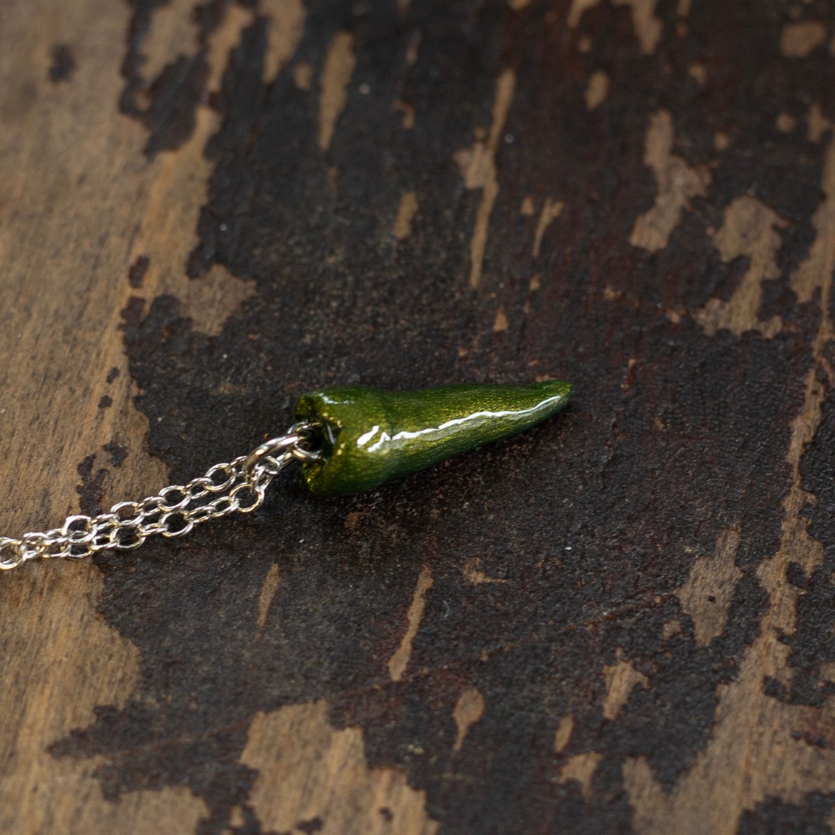 Premolar tooth necklace in "Moss" on silver chain