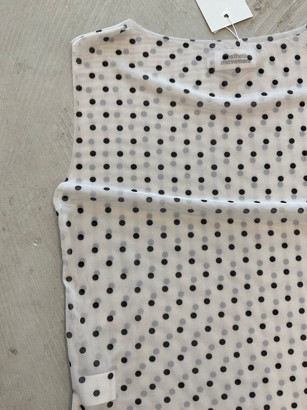 White mesh top with dots