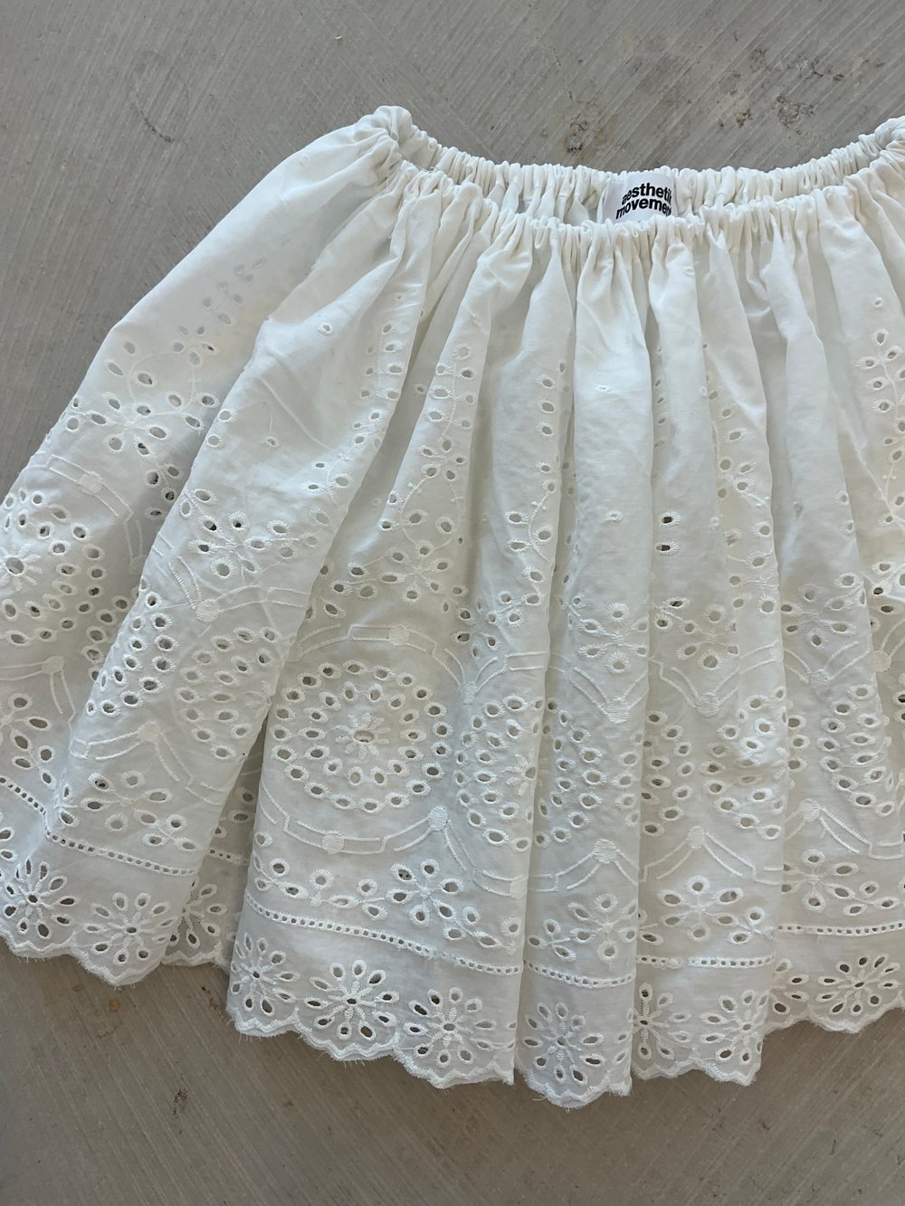 White mini skirt embroidered light cotton