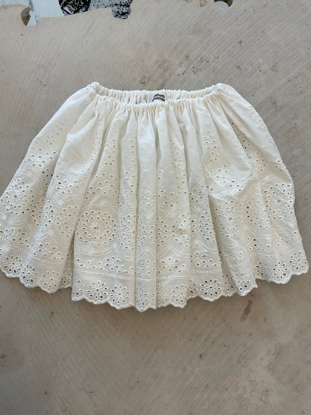 White mini skirt embroidered light cotton
