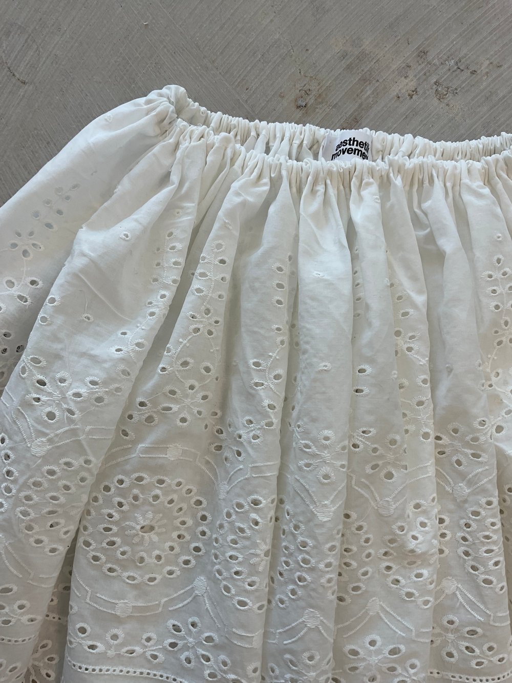White mini skirt embroidered light cotton