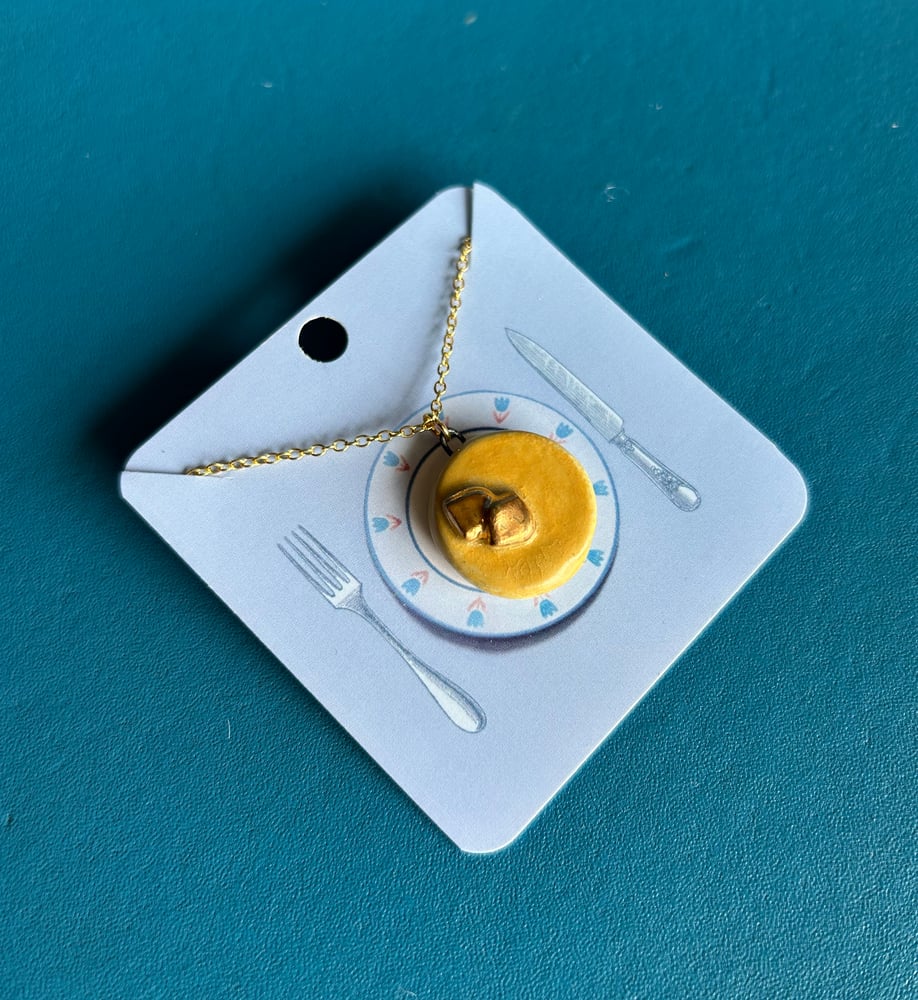 Image of Porcelain Pancake with Gold Butter Pendant