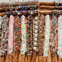 Image 1 of Handcrafted Chocolate Dipped Pretzel Rods By The Dozen 