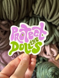 protect the dolls sticker