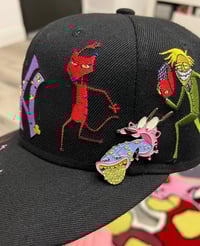 Image 2 of FUNGUS TONGUE COURAGE PIN GLOW IN THE DARK