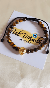 Image 1 of Lion Head with Tiger Eye Stone