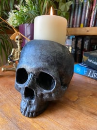 Image 1 of replica human skull candle/incense holder (weathered iron effect)