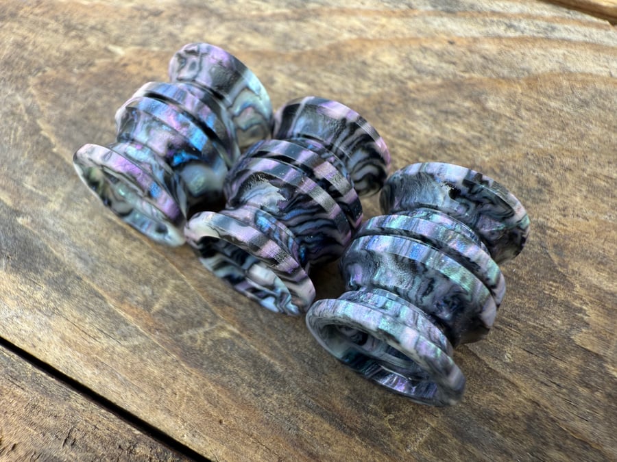 Image of Large Hues of Purple, Blue, Black, Pink, and Pearl-ish White 
