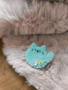 Broches Mochicats 