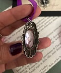 Magnifique pendentif XIXème siècle en argent massif et cristal mauve faceté.