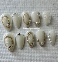 Image 1 of IVORY AURA