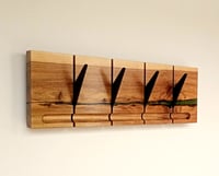 Image 2 of Flip wood coat rack, 4 metallic hooks. From the "Wounded wood" series.