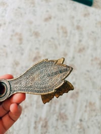 Image 3 of brass butterfly wall clip