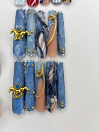 Image 2 of Levii’s Jeans (size small)