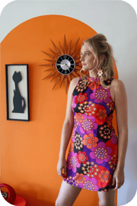 Image 1 of Turtle Neck Mini In Get Groovy Redand Purple 