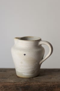 Image 4 of milk jug