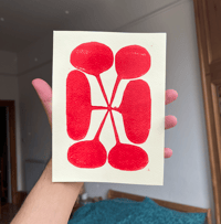 Image 1 of red flower