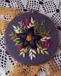 Image 1 of 6” Black and grey floral embroidery with green and maroon leaves on dark grey fabric