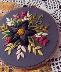Image 2 of 6” Black and grey floral embroidery with green and maroon leaves on dark grey fabric