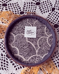 Image 3 of 6” Black and grey floral embroidery with green and maroon leaves on dark grey fabric