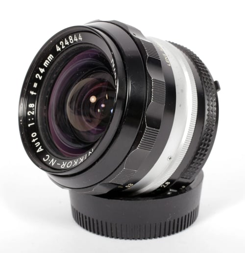 Image of Nikon NIKKOR N-C 24mm F2.8 AI lens for all nikon F mount camera bodies #0738