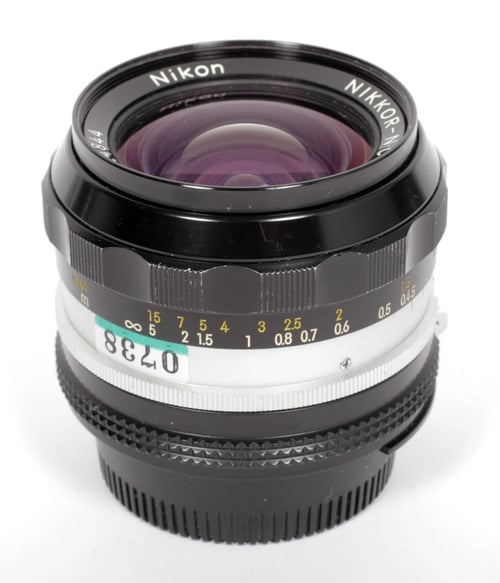Image of Nikon NIKKOR N-C 24mm F2.8 AI lens for all nikon F mount camera bodies #0738