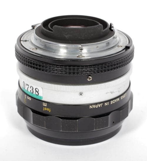 Image of Nikon NIKKOR N-C 24mm F2.8 AI lens for all nikon F mount camera bodies #0738