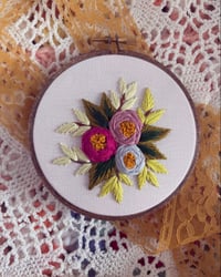Image 1 of Small 4” pink, blue, and purple floral embroidery hoop