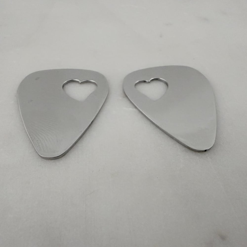 Image of High Quality 10 Pieces Pack Cut Open Heart Steel Guitar Pick Blank for Laser Engraving.