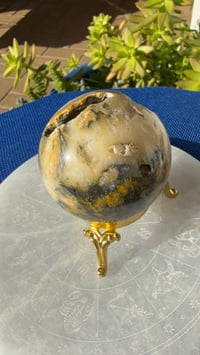 Image 1 of BUMBLEBEE JASPER SPHERE WITH CAVES 5CM