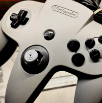 Image 1 of N64 - Black Buttons (Dyed OEM)