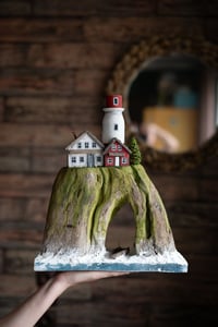 Image 3 of Lighthouse with houses on the rock