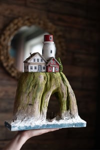 Image 2 of Lighthouse with houses on the rock