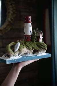 Image 2 of  Lighthouse with a house