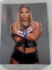 Puerto Rican wrist wrap autographed 8x10