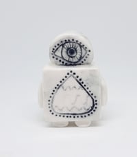 Image 1 of a robot with killer lashes