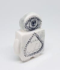 Image 2 of a robot with killer lashes