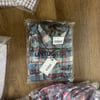 Close-out lot of 60 Brand New UNTUCKit pieces ($9.50 per unit)