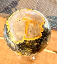 Image 1 of BUMBLEBEE JASPER SPHERE WITH CAVES 6CM