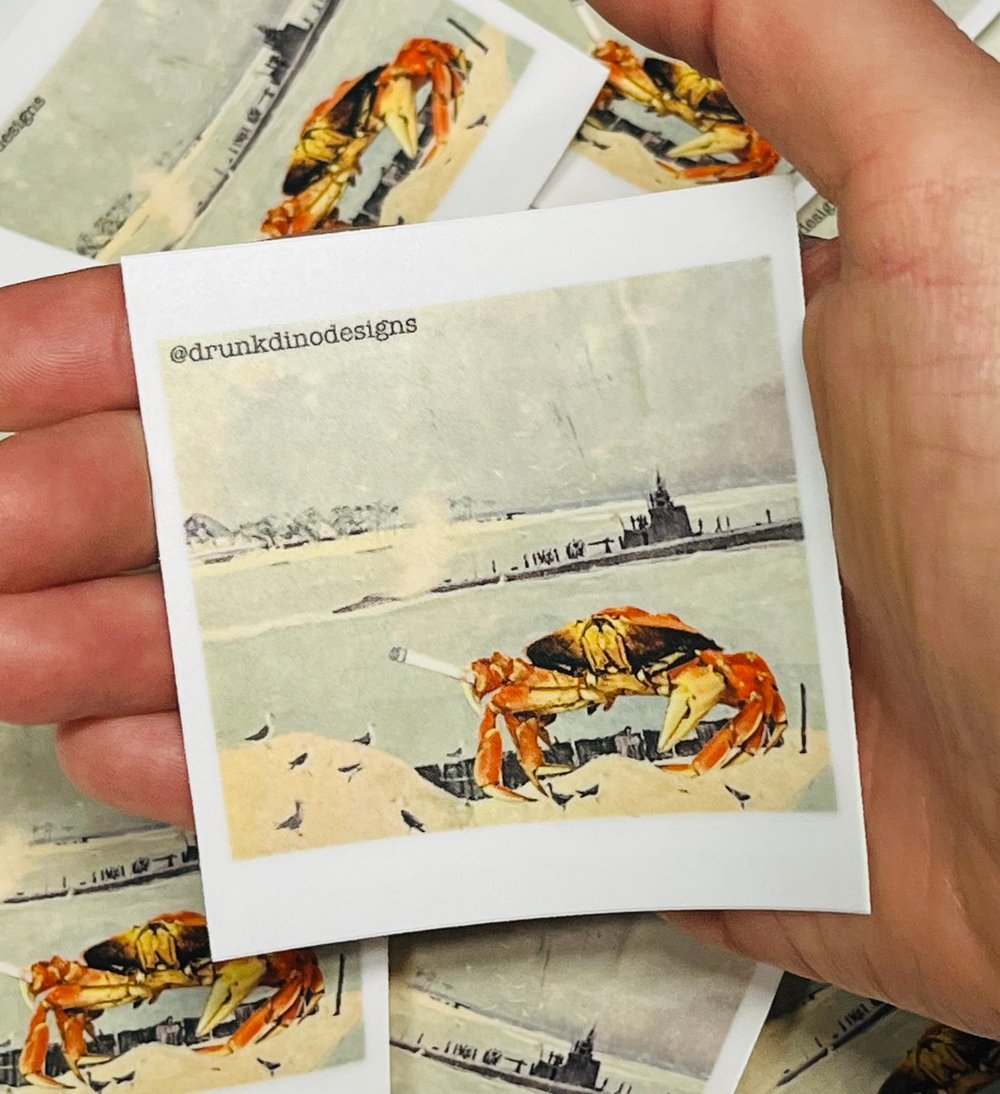 Image of Crabby Smoking on a Beach