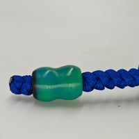 Image 4 of Ring worry stone- blue/green swirls 