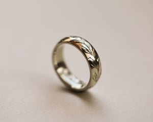 Image of 18ct White gold 6mm ‘Olive leaf’ engraved court ring