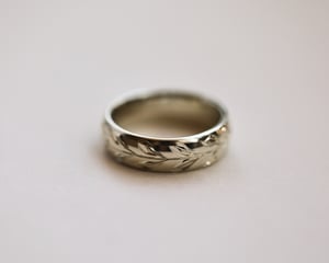 Image of 18ct White gold 6mm ‘Olive leaf’ engraved court ring