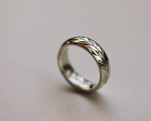 Image of 18ct White gold 6mm ‘Olive leaf’ engraved court ring