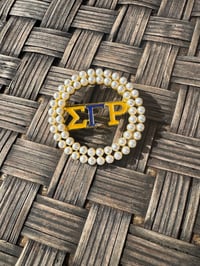 Sigma Gamma Rho Brooch
