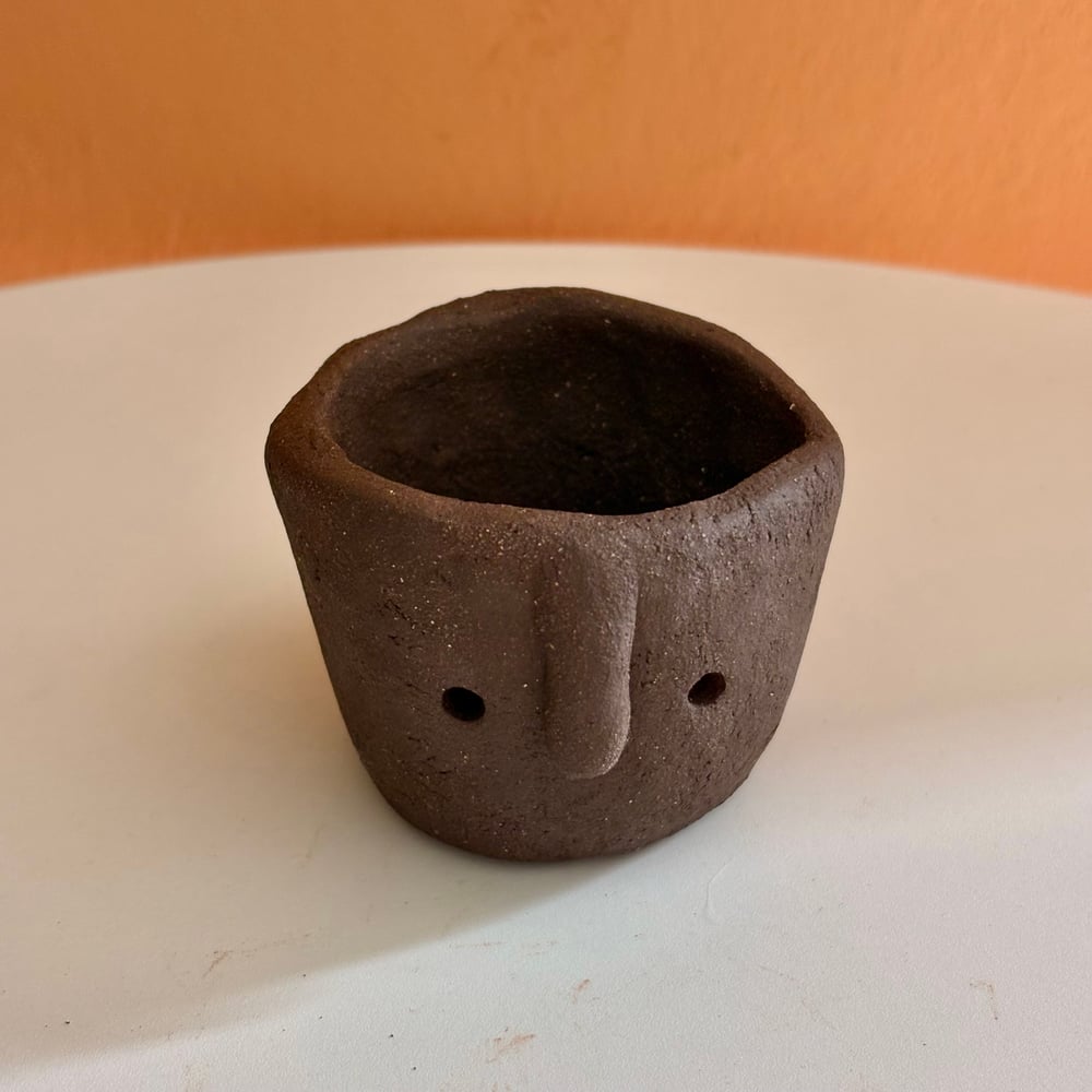 Image of Black Clay head pot