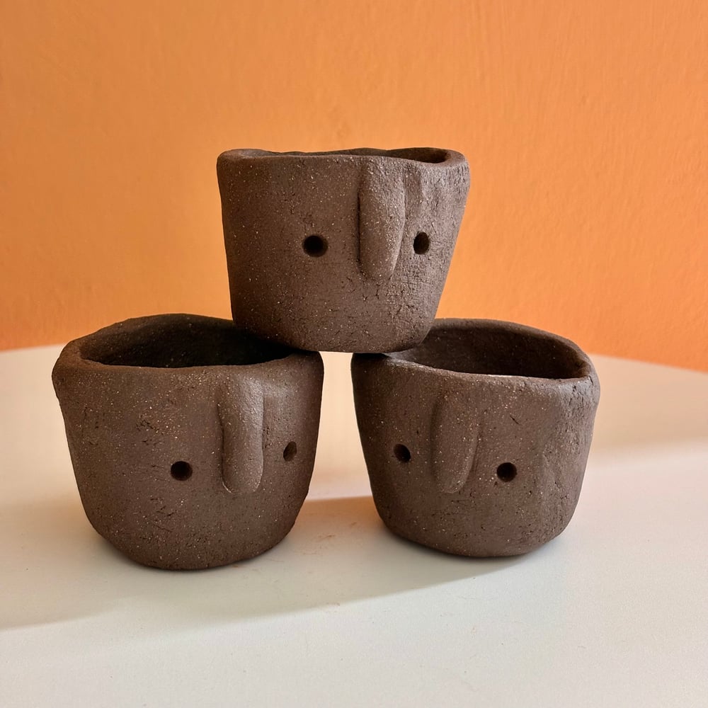 Image of Black Clay head pot