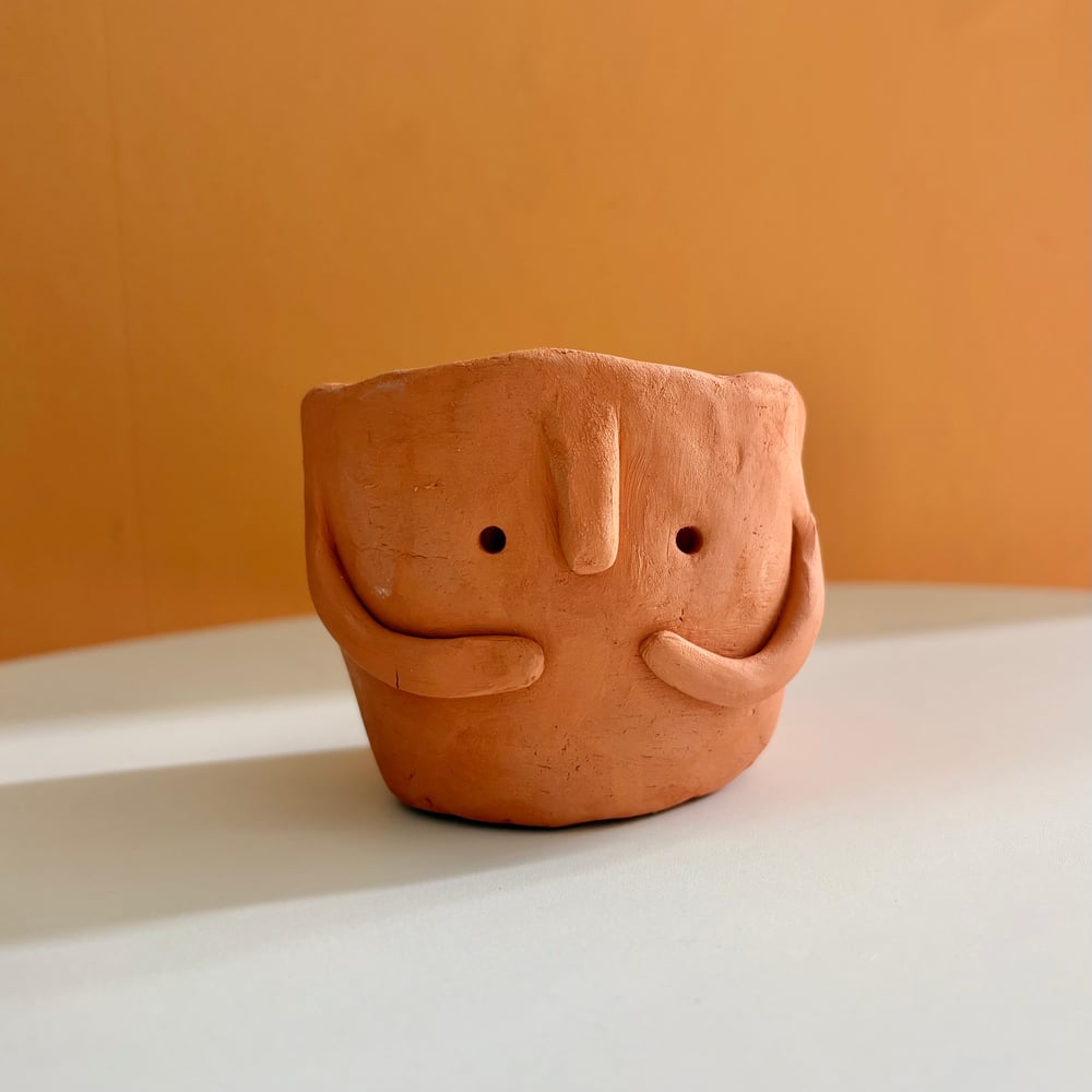 Image of Terracotta buddy