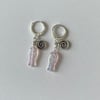 'swirl fish' silver huggie hoop earrings